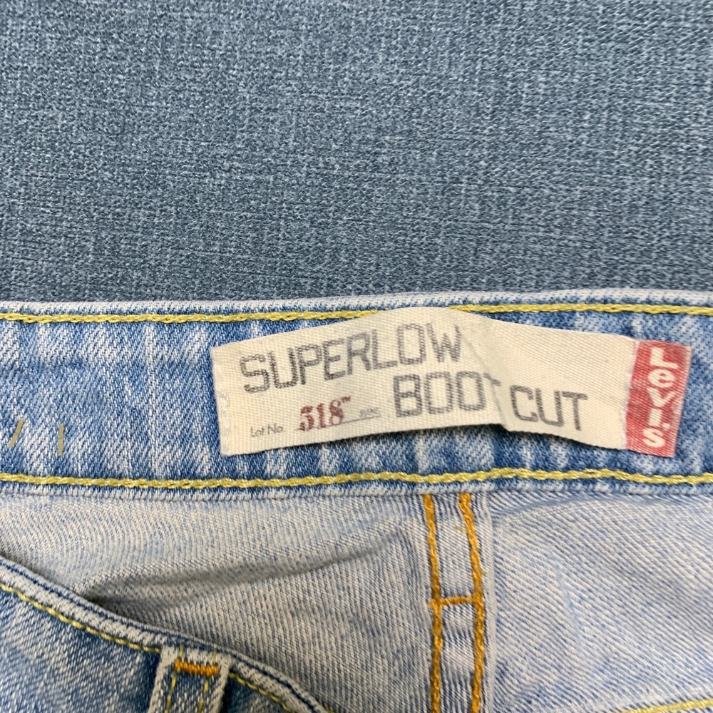 Levi's 518 Superlow Cut Off Shorts Womens Blue Denim Light Wash Red Tab Raw Hem - Picture 10 of 15